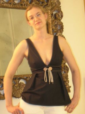 A tall blonde with wide hips undressed at home and showed tits. Part 2. Thumb 14