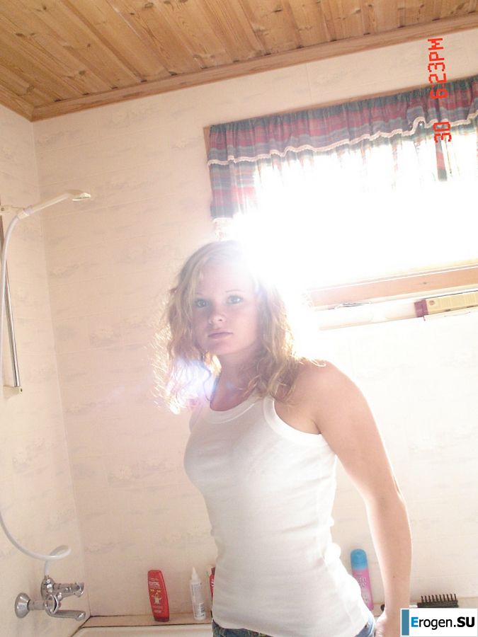 A blue-eyed minx with a pierced nipple plays with her panties. Part 2. Photo 10