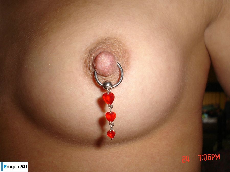 A blue-eyed minx with a pierced nipple plays with her panties. Part 2. Photo 15