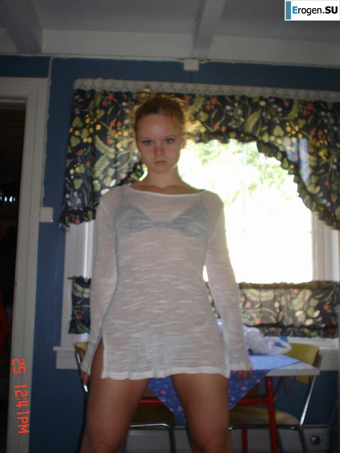 A blue-eyed minx with a pierced nipple plays with her panties. Part 2. Photo 21