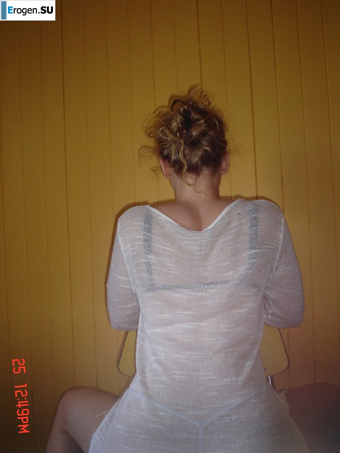 A blue-eyed minx with a pierced nipple plays with her panties. Part 2. Photo 24