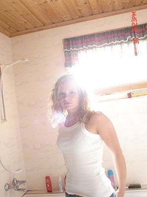 A blue-eyed minx with a pierced nipple plays with her panties. Part 2. Thumb 10