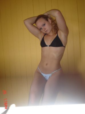 A blue-eyed minx with a pierced nipple plays with her panties. Part 2. Thumb 39