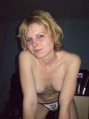 A young blonde in red lingerie stood up with cancer and spreads her pussy. Thumb 6