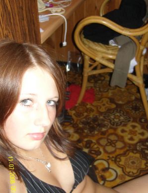 A young girl with a beautiful figure poses in shorts. Thumb 14