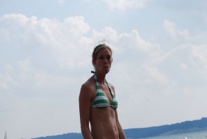 A slender woman with neat breasts takes off her clothes. Thumb 19