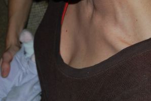 A slender woman with neat breasts takes off her clothes. Thumb 31