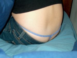 A brunette takes off her underpants and masturbates, not embarrassed by a guy. Thumb 8