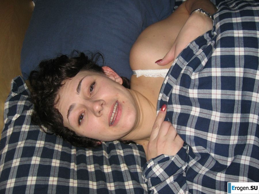 A curly-haired mature beauty is not shy about having sex on camera. Photo 14