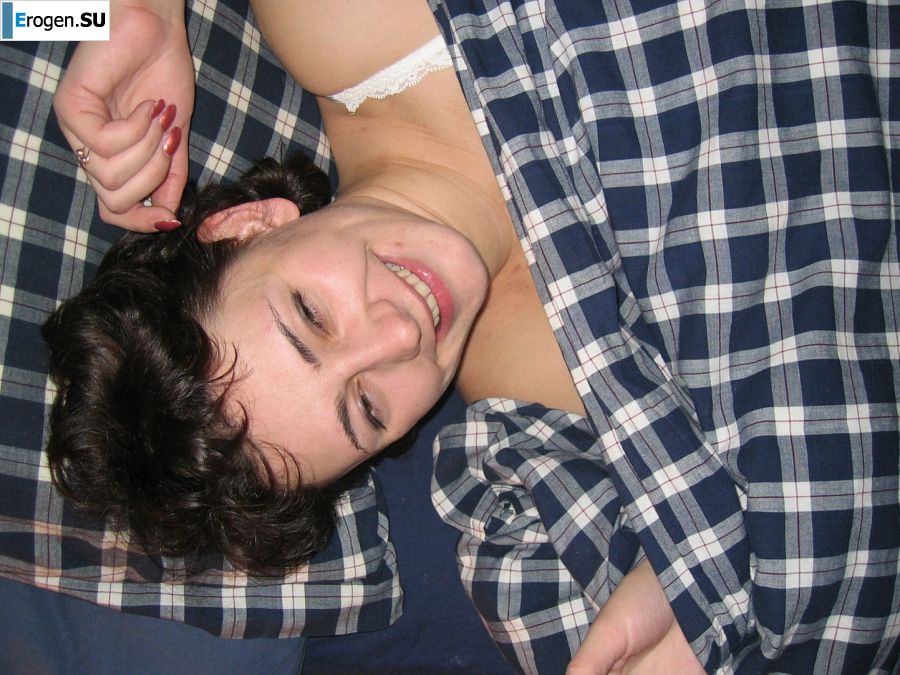 A curly-haired mature beauty is not shy about having sex on camera. Photo 16