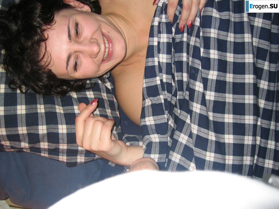 A curly-haired mature beauty is not shy about having sex on camera. Photo 17