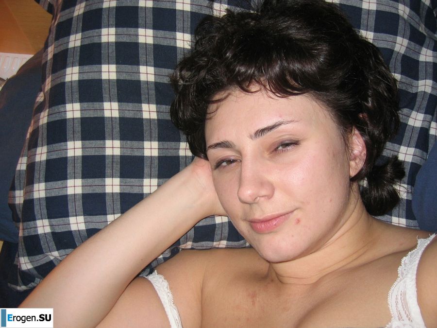 A curly-haired mature beauty is not shy about having sex on camera. Photo 19