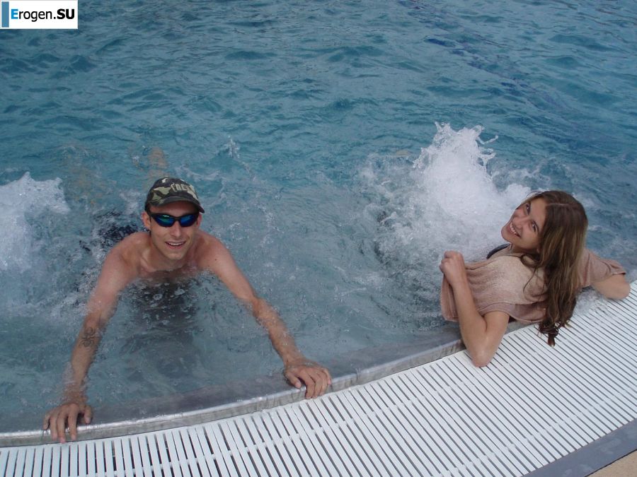 A woman caresses herself spreading her legs apart on the camera. Photo 21