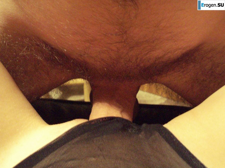 A woman caresses herself spreading her legs apart on the camera. Photo 29