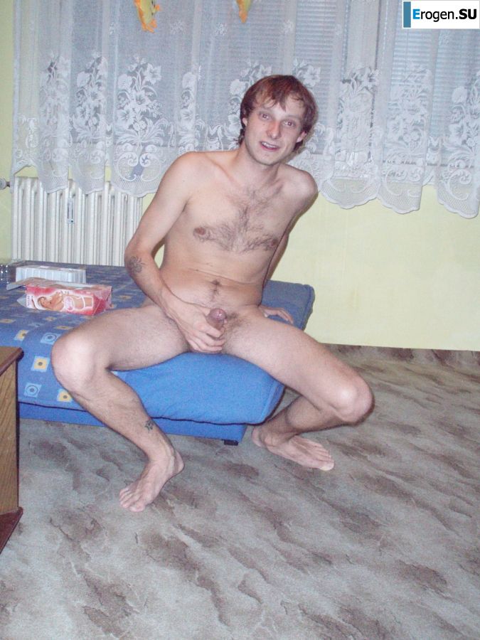 A woman caresses herself spreading her legs apart on the camera. Photo 31