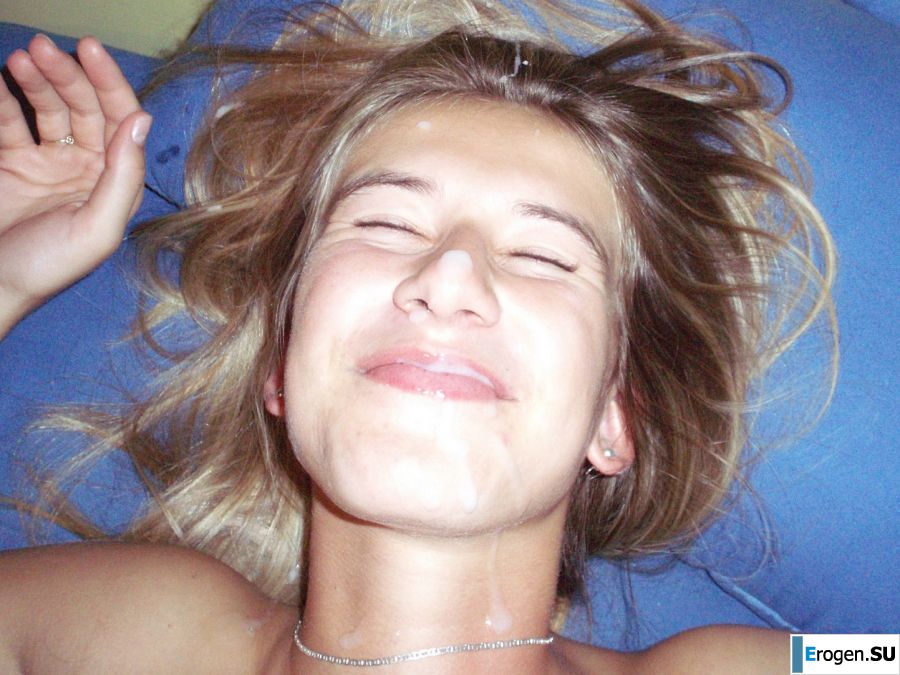 A woman caresses herself spreading her legs apart on the camera. Photo 38