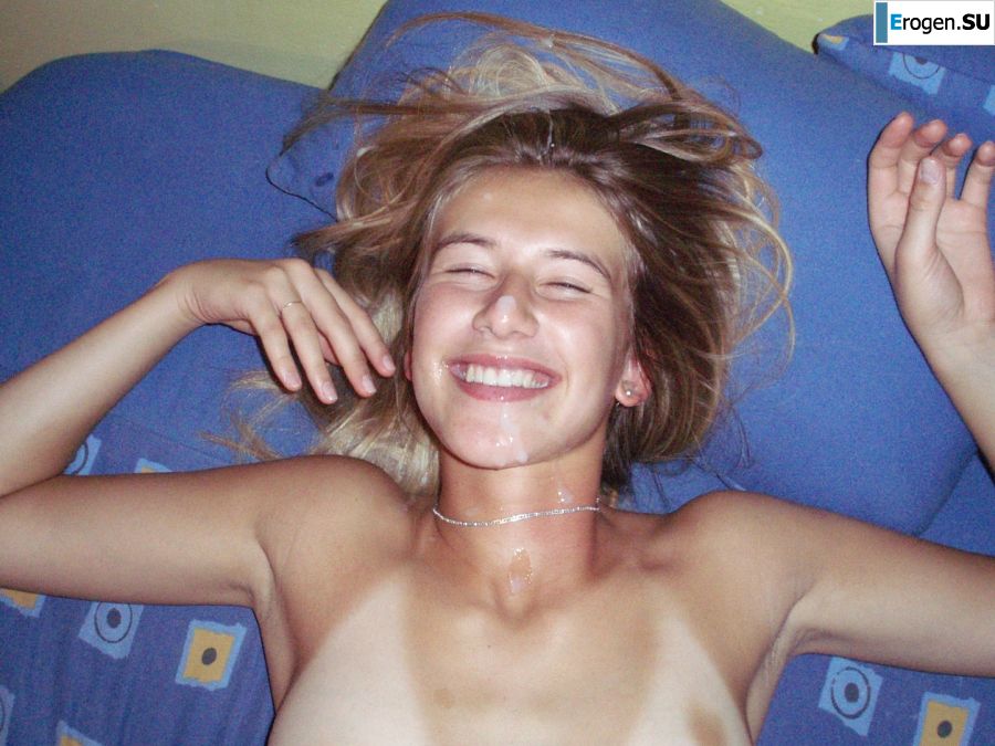 A woman caresses herself spreading her legs apart on the camera. Photo 39