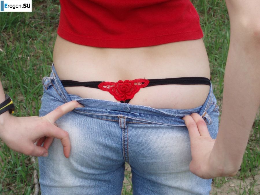 A woman caresses herself spreading her legs apart on the camera. Photo 5