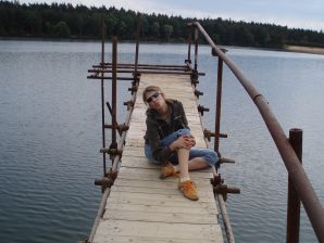 A woman caresses herself spreading her legs apart on the camera. Thumb 19