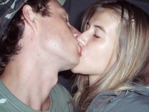 A woman caresses herself spreading her legs apart on the camera. Thumb 2