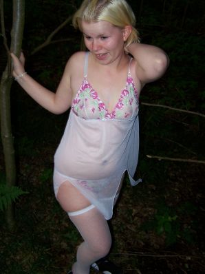 Appetizing magnificent blonde spread her legs right on the grass. Thumb 17