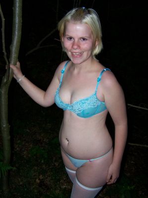 Appetizing magnificent blonde spread her legs right on the grass. Thumb 23