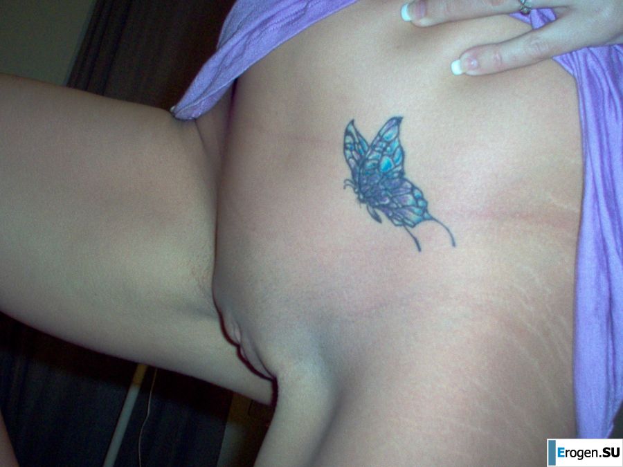 Seductive nurse masturbates on the couch. Photo 26