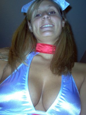 Seductive nurse masturbates on the couch. Thumb 34