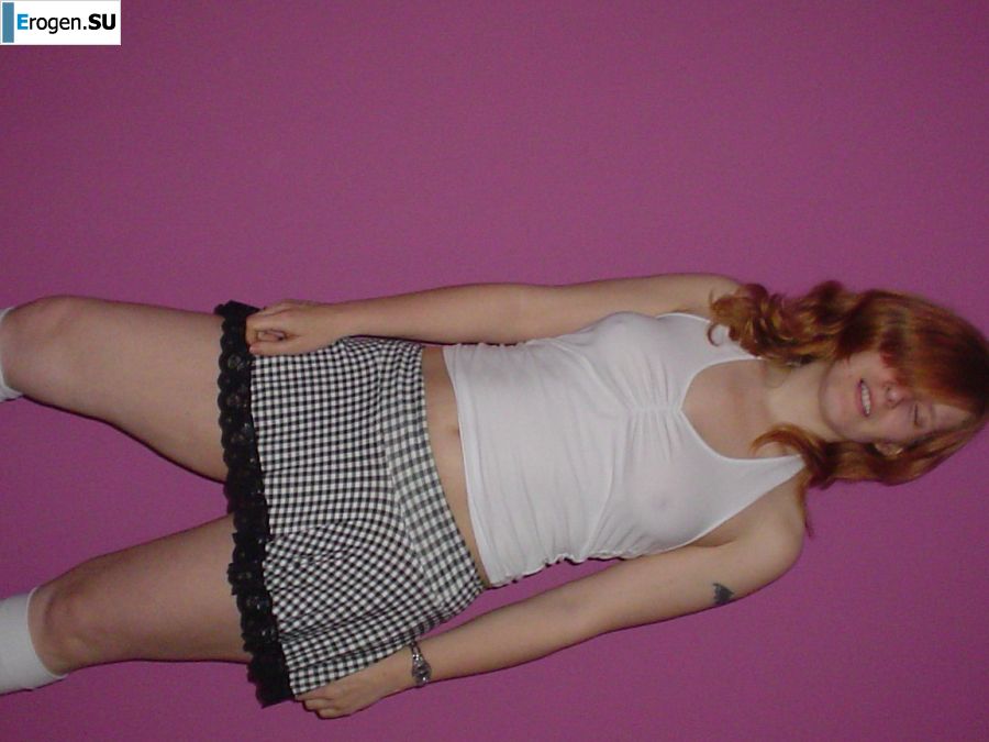 A red-haired student with glasses spread her legs in lace stockings and showed a pussy. Part 2. Photo 33