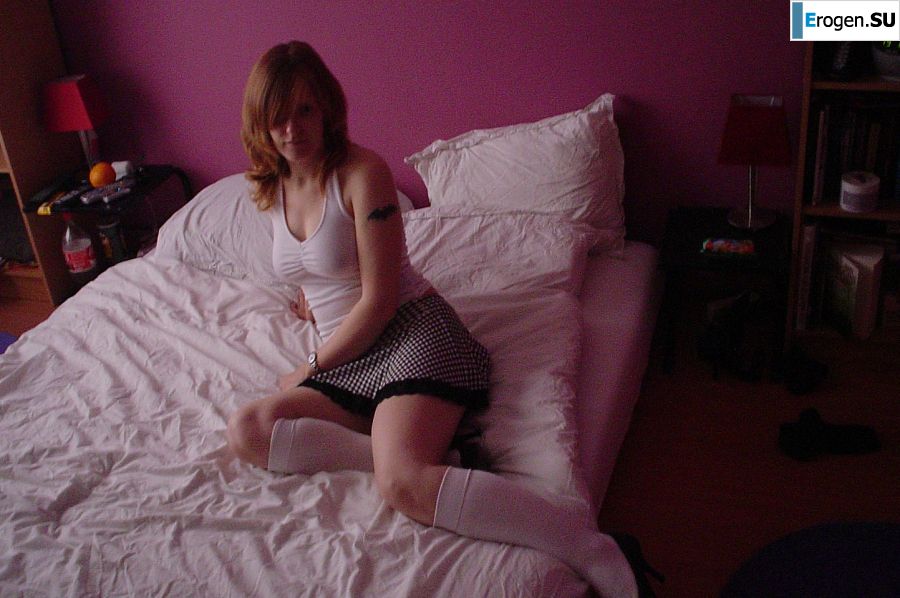 A red-haired student with glasses spread her legs in lace stockings and showed a pussy. Part 2. Photo 39