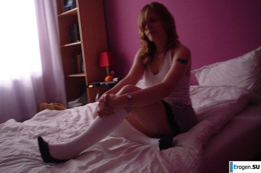 A red-haired student with glasses spread her legs in lace stockings and showed a pussy. Part 2. Photo 40