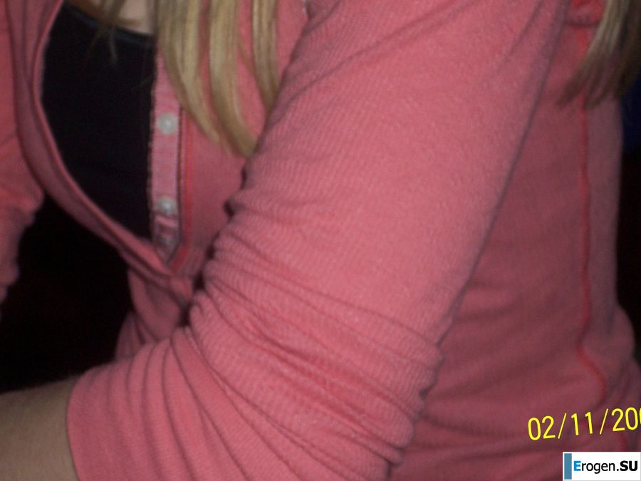 A young girl pleases herself with a finger and a pink vibrator. Photo 24