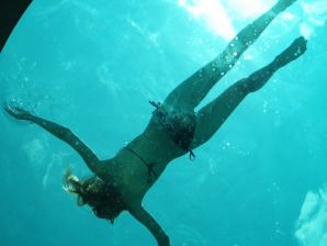 A woman caresses herself spreading her legs apart on the camera. Part 2. Thumb 12