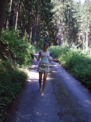 A woman caresses herself spreading her legs apart on the camera. Part 2. Thumb 14