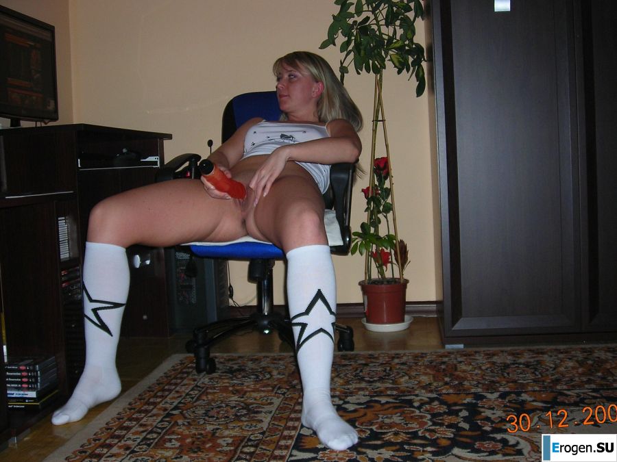 Appetizing blonde masturbates in front of the computer. Photo 3