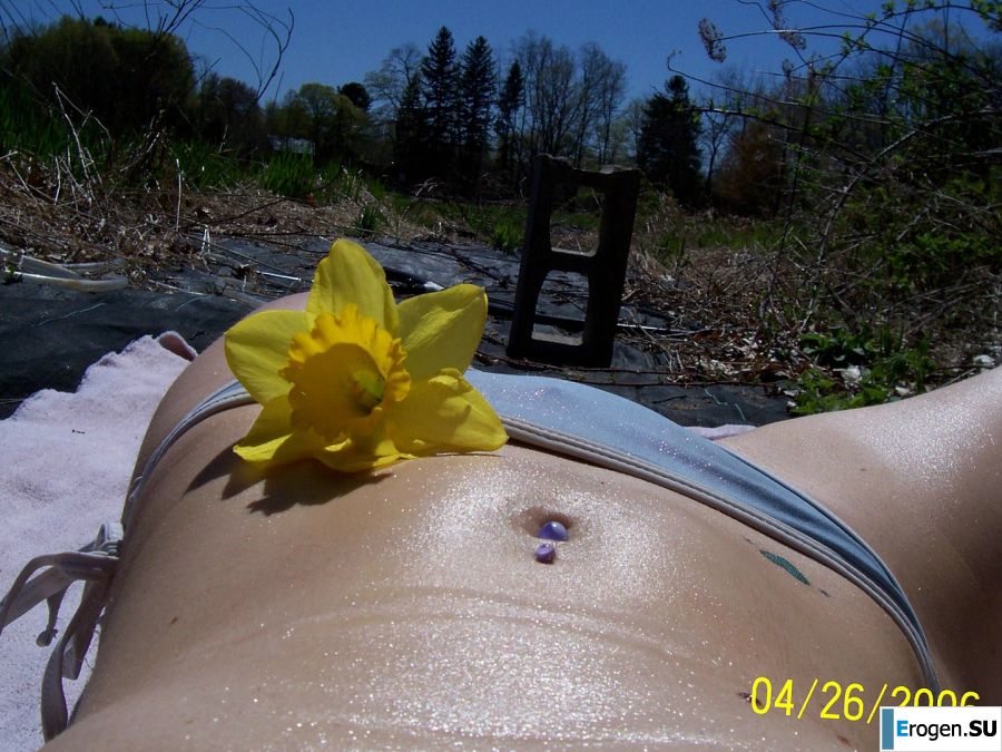 Passionate minx dances striptease in nature with a snake. Photo 16