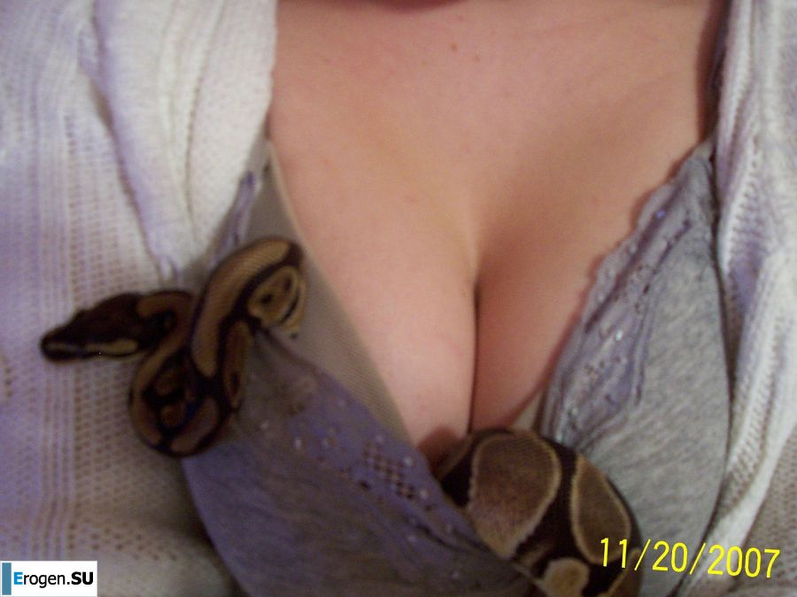 Passionate minx dances striptease in nature with a snake. Photo 41