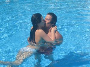 A slender woman at the sea took off a white swimsuit in front of her husband. Thumb 29