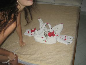 A slender woman at the sea took off a white swimsuit in front of her husband. Thumb 30