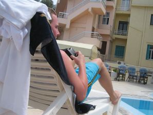 A girl has fun with a guy on vacation - shows her ass and chest. Thumb 24
