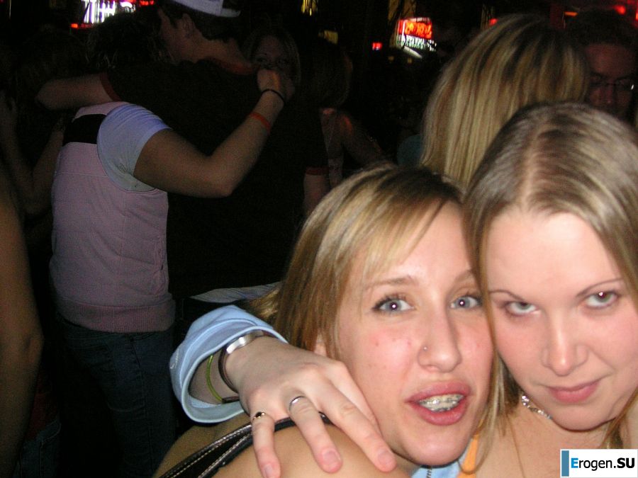 A sexy girl lights up at a party in fishnet stockings. Photo 18