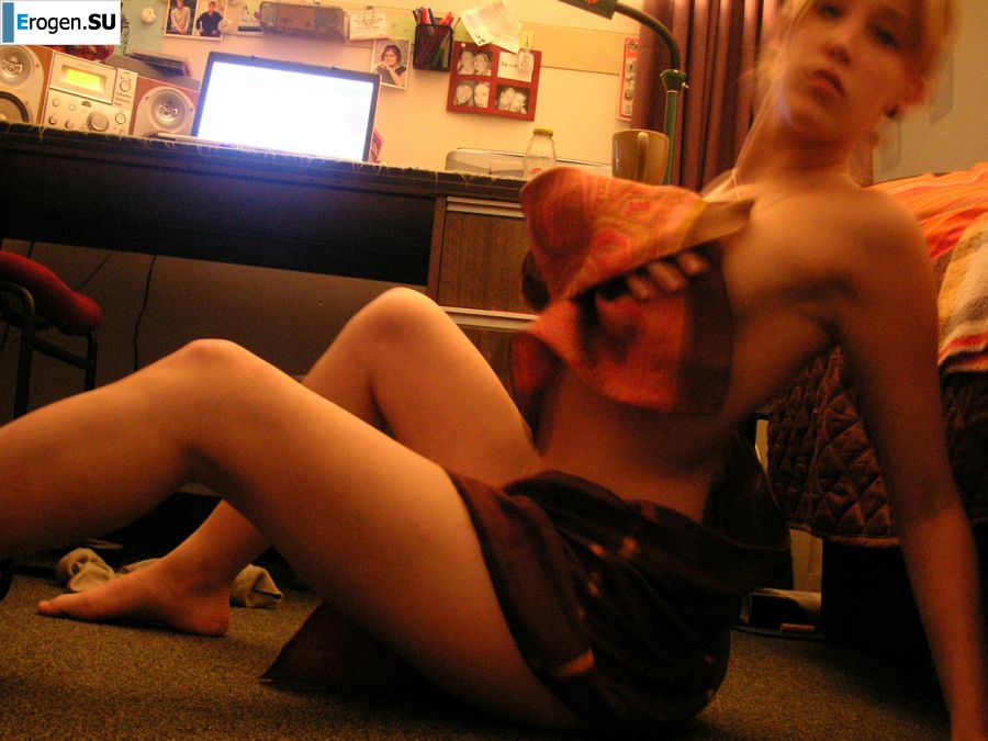 A sexy girl lights up at a party in fishnet stockings. Photo 22