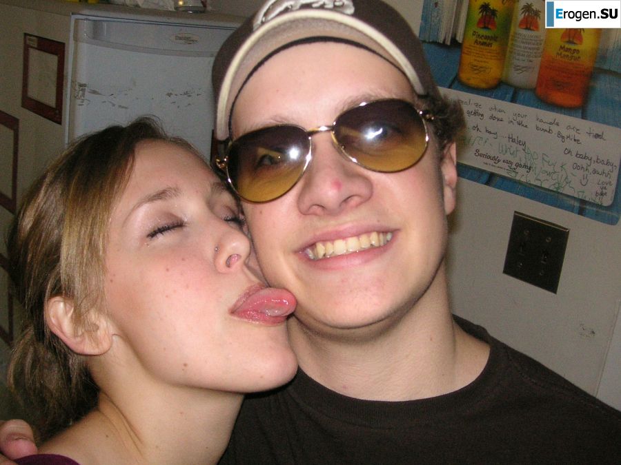 A sexy girl lights up at a party in fishnet stockings. Photo 3