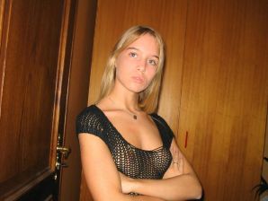 A young blonde in stockings spreads her legs on the couch. Part 2. Thumb 2