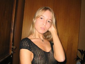 A young blonde in stockings spreads her legs on the couch. Part 2. Thumb 3