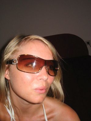 A young blonde in stockings spreads her legs on the couch. Part 2. Thumb 36