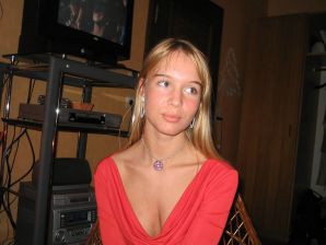 A young blonde in stockings spreads her legs on the couch. Part 2. Thumb 5