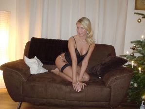A young blonde in stockings spreads her legs on the couch. Part 3. Thumb 19