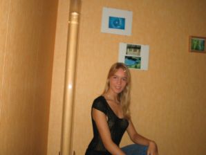 A young blonde in stockings spreads her legs on the couch. Part 3. Thumb 2