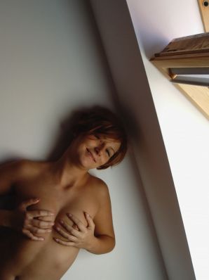 Naughty red-haired girl in pink panties fingering nipples. Thumb 15